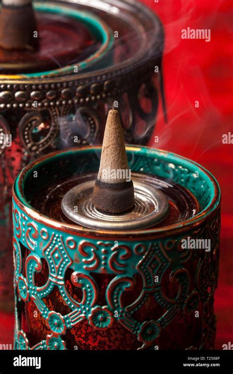 Burning aromatic incense cones Stock Photo - Alamy