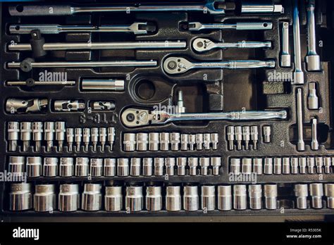 Box with special tools in car repair shop Stock Photo - Alamy