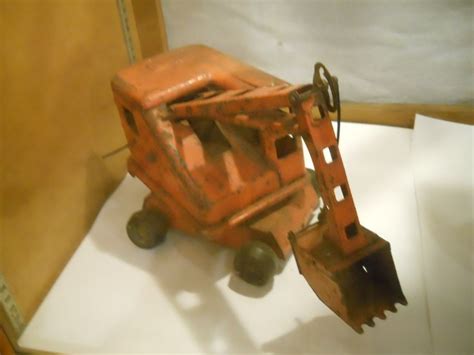 Olden Day Metal Backhoe | Antique Kids Games & Toys | Pinterest | Metals