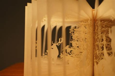 Laser Cut Paper Sculptures Created with Books