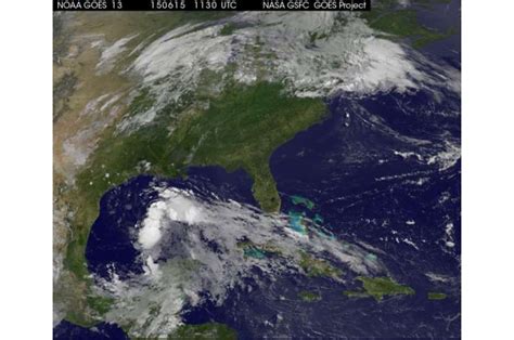 Satellite animation shows System 91L developing in the Gulf of Mexico