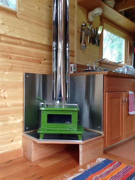 Jenn’s Tiny House | Tiny House Swoon | Tiny wood stove, Small wood ...