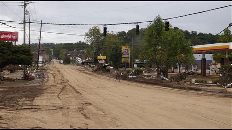 Asheville locals react to devastating flooding damage | wbir.com