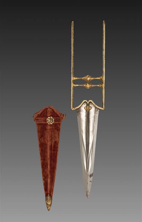 Katar dagger, 1700s. India, Mughal. Iron handle with gold inlay; steel ...