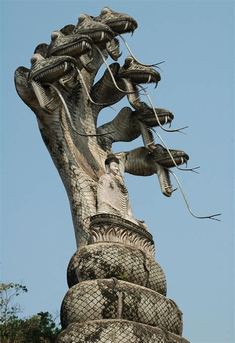 Buddha and the Seven-headed serpents statue in Sala Kaew Ku, Thailand ...