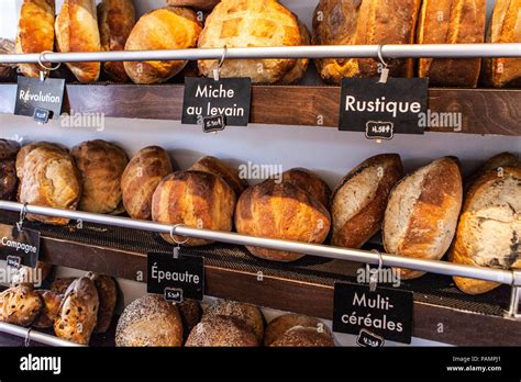 French bakery display with different kinds of bread loaves Stock Photo ...