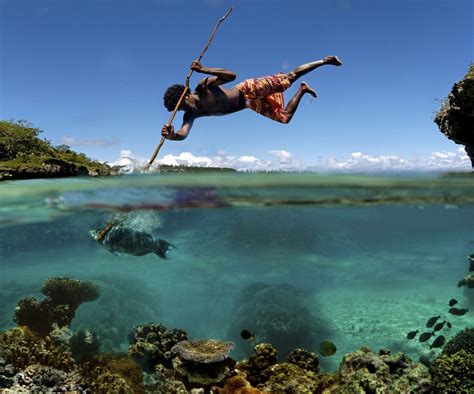 Fishing. | Spearfishing, Popular photography, Cool photos