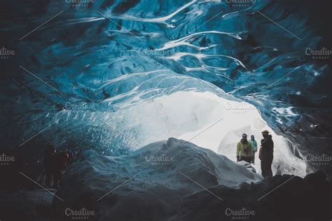 Exploring a blue Glacier Ice Cave ~ Holiday Photos ~ Creative Market