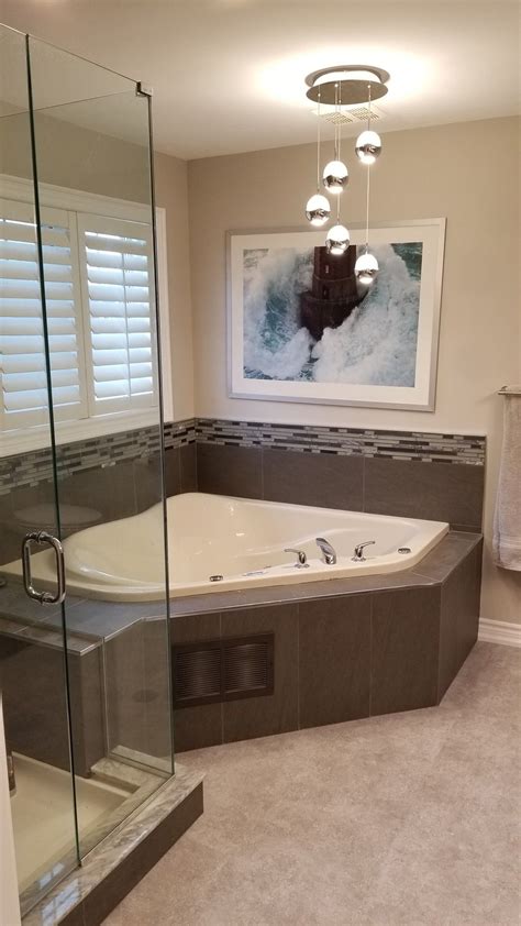 Updated jacuzzi tub with accent tiles | Tub remodel, Top bathroom ...