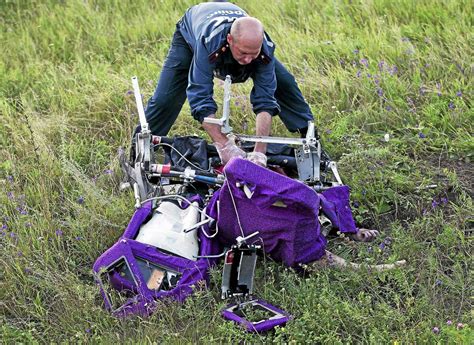 Bodies from Malaysian Airlines crash bound for rebel-held city