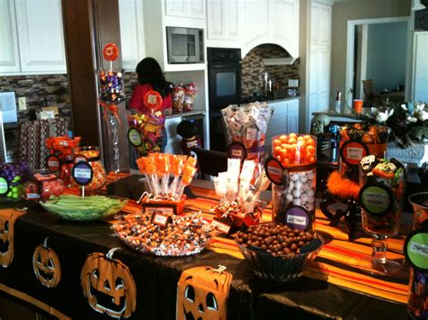 a table filled with candy and candies for halloween