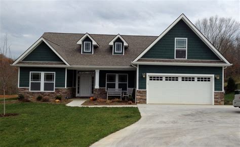 Custom Built Home | Green siding, Custom built homes, Exterior siding