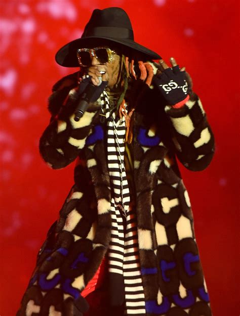 Lil Wayne's Colorful Stage Outfit at the College Football Playoff ...