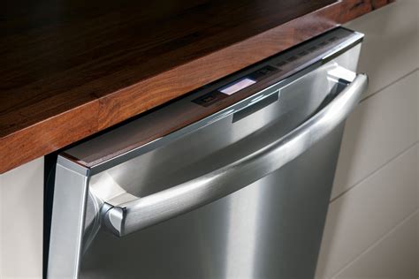 The dishwasher door on the GE Profile Series dishwasher installs flush ...