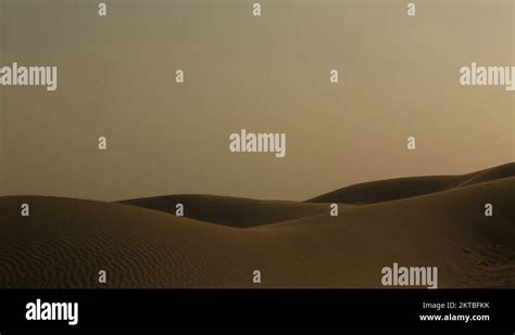 Camel and camel rider walk through the Thar desert ,Jaisalmer,rajasthan ...