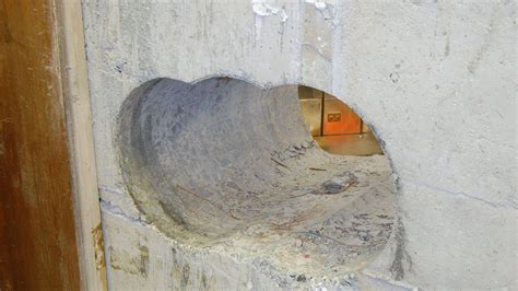 INCREDIBLE HEIST: Robbers drill giant hole through vault to steal $300M ...