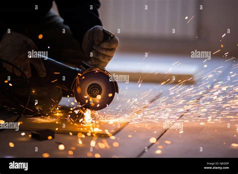 Cutting metal with angle grinder Stock Photo - Alamy