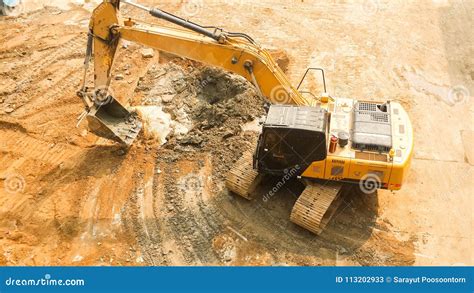 Aerial View of Tracked Excavator Starts Digging Ground Preparing To ...