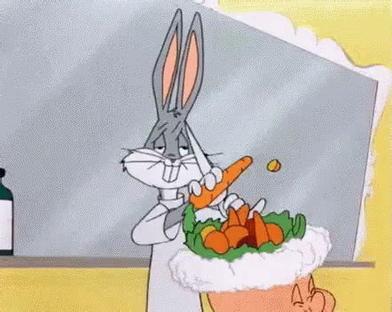 Bugs Bunny Cutting Carrots GIF - Bugs Bunny Cutting Carrots - Scopri e ...