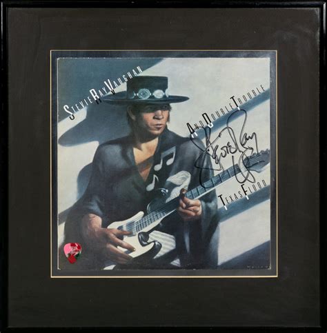 At Auction: Stevie Ray Vaughan: Signed 'Texas Flood' album cover with pick