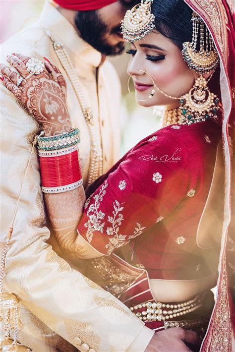 Punjabi Wedding with the bride in a stunning Lehenga | Wedding couple ...