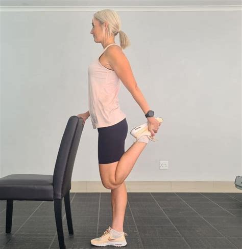 Standing Quad Stretch - Exercises For Injuries