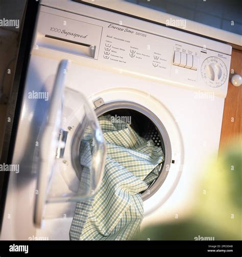 Front loader washing machine Stock Photo - Alamy