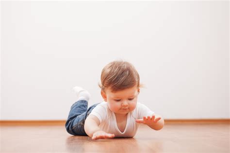 When Do Babies Roll Over? (And How To Encourage It) - Baby Chick