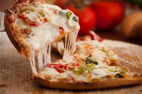 Just 10 Delicious Images Of Pizza With Cheese Oozing Out Because Why Not!