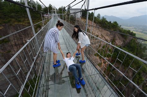 China dares you to cross its giant glass bridge | The Verge