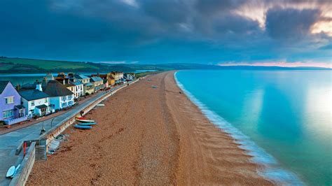 Beautiful Scenery Beach Sand Ocean Houses Under White Clouds Blue Sky ...