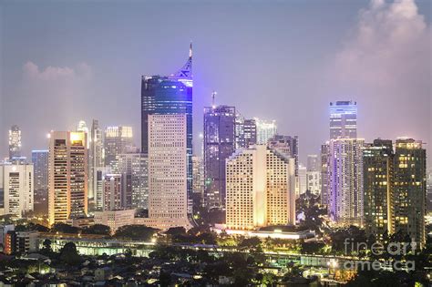 Aerial night view of Jakarta urban skyline in Indonesia Photograph by ...