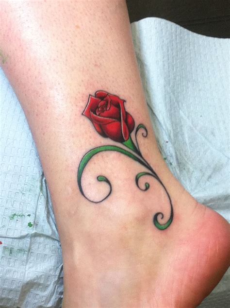 rosebud tattoo | Rose bud tattoo, Red rose tattoo, Rose tattoo design