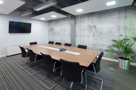 Modern Office Meeting room with concrete wallpaper and lighting.