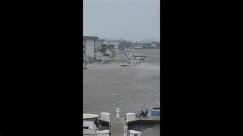 Debris Flows Through Flooded Area of Naples as Hurricane Ian Moves Over ...