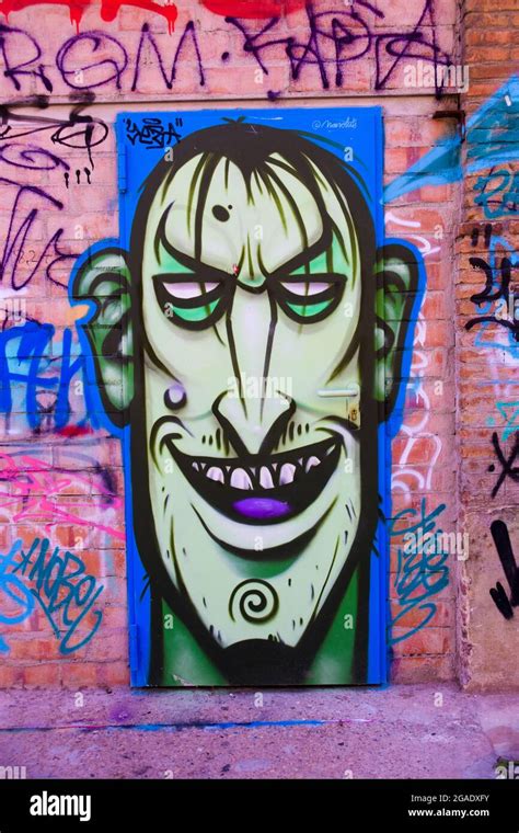 Street art. Portrait of a man in cartoon style. Graffiti on a wall ...