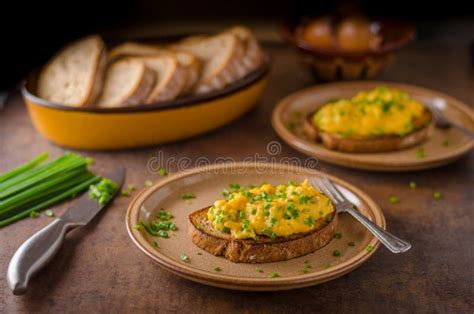 Scrambled eggs with herbs stock image. Image of bread - 105171849