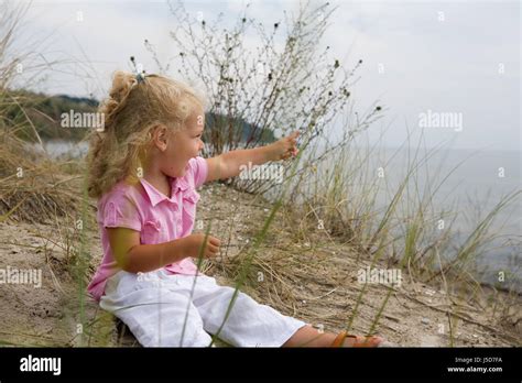 girl with finger pointing Stock Photo - Alamy