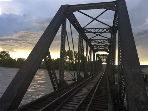 Railroad bridge over the Yellowstone River near Laurel, MT. [OC] : r ...