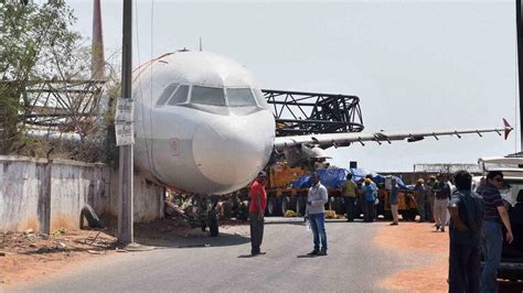 Crane carrying defunct Aircraft crashes in Begumpet Airport, Hyderabad ...