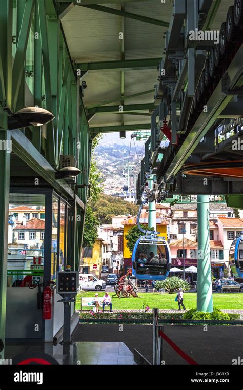 Funchal cable car leaving from the city station Stock Photo - Alamy