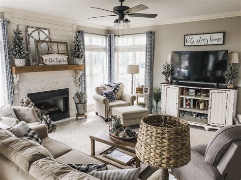 Cozy Winter Living Room decor fireplace, birch logs, flocked greenery ...