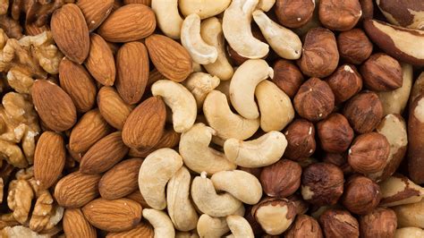 Just a handful of nuts may help keep us from packing on the pounds as ...