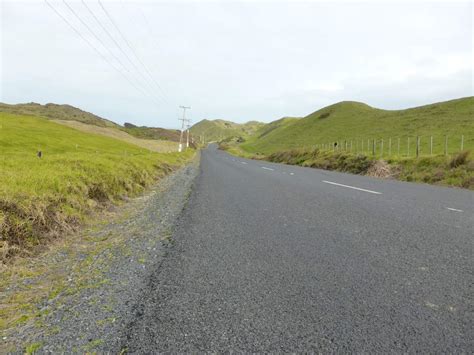 Marking the edge of the road with markers and cat's eyes