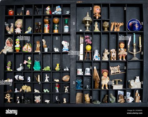 Set of knick knacks, miniatures, souvenirs, and collectibles on a ...