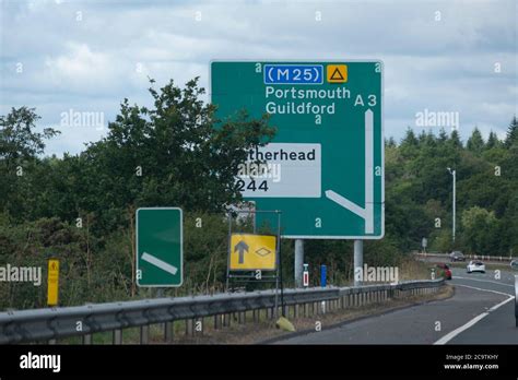 Partially obsured route signs on the A3 dual carriageway in Surrey ...