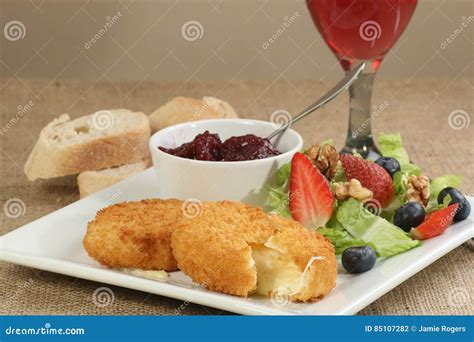 Baked camembert with salad stock photo. Image of strawberry - 85107282