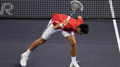 Novak Djokovic takes frustration out on his racket