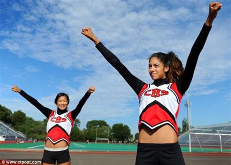 High school cheerleaders rebel over skimpy outfits as they tell school ...