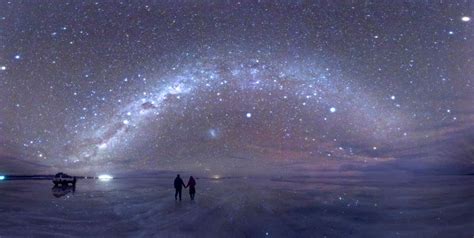 Night sky reflected in Salar de Uyuni, a large salt flat in Bolivia ...